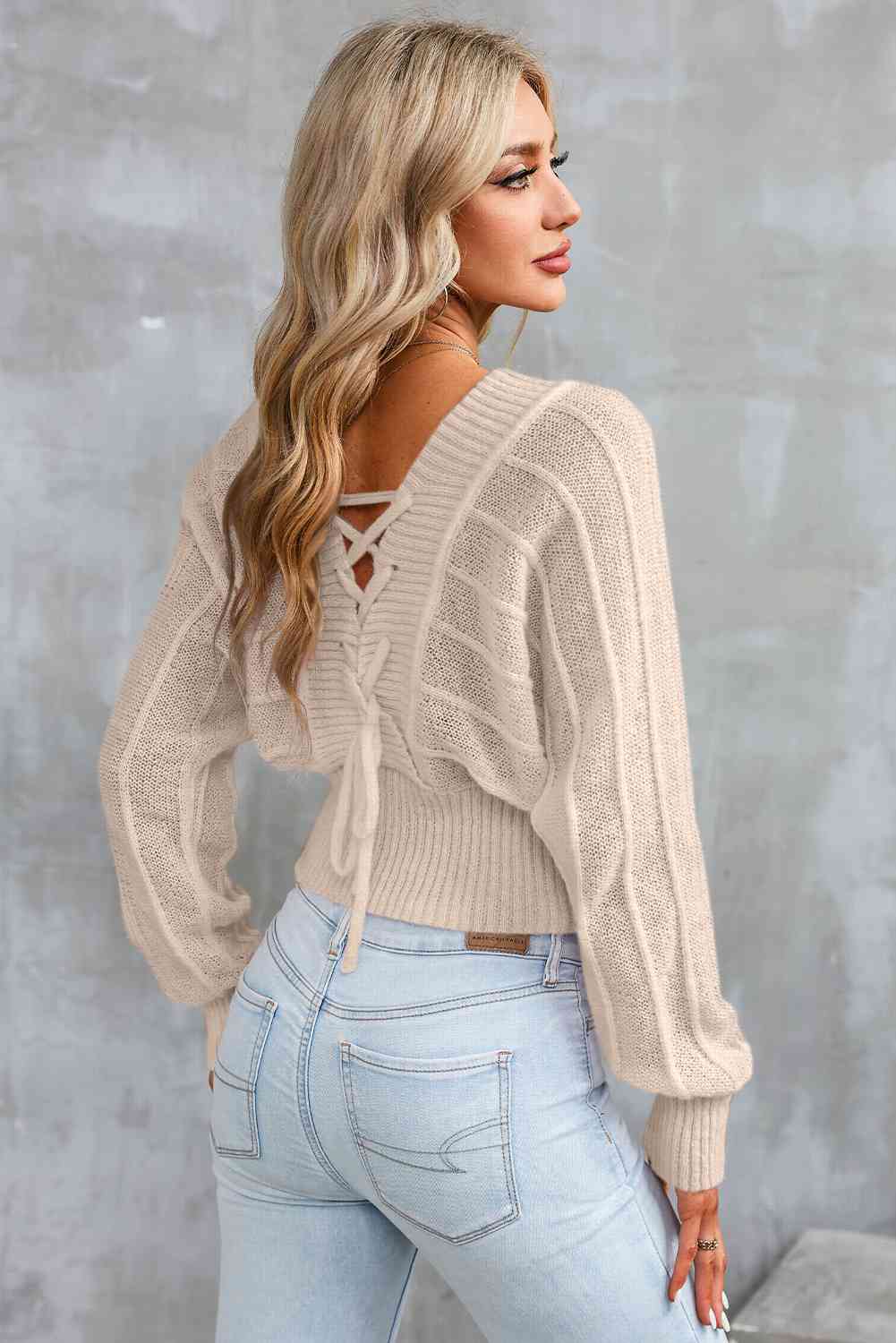 Surplice Neck Lace-Up Sweater Trendsi